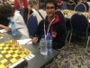 Armaan prepares for his game in round 1 of U15 boys v Piotr Kowal