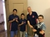 GM Glenn Flear (coach) presents the iconic ECF silver badges to Nadhmi, Denis and Adam